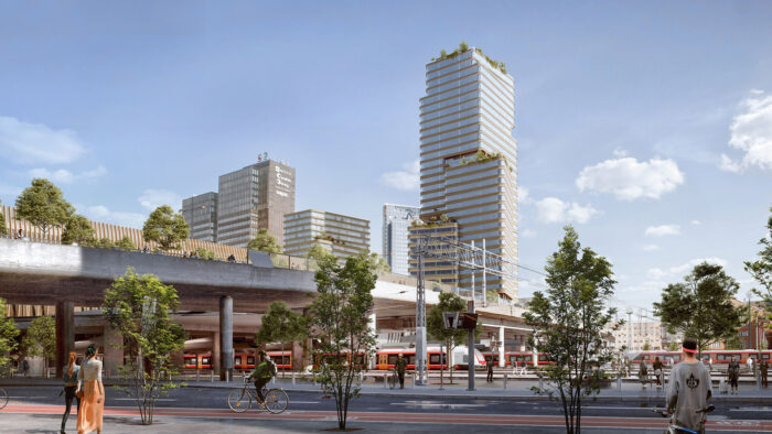 A city with tall, modern glass-fronted buildings