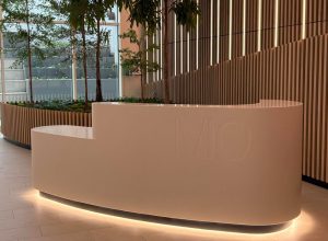 a reception area with a large white reception table